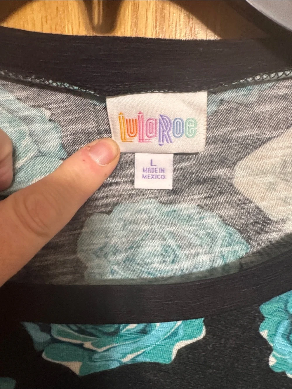 LuLaRoe Teal & White Rose Print Short Sleeve Olive Tee - Picture 2 of 5